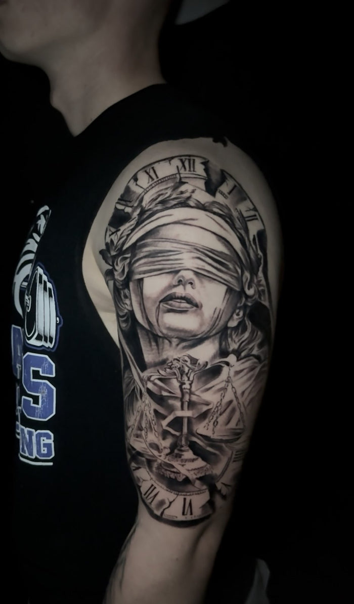Lady Justice and clock half sleeve tattoo by Austina Obscure