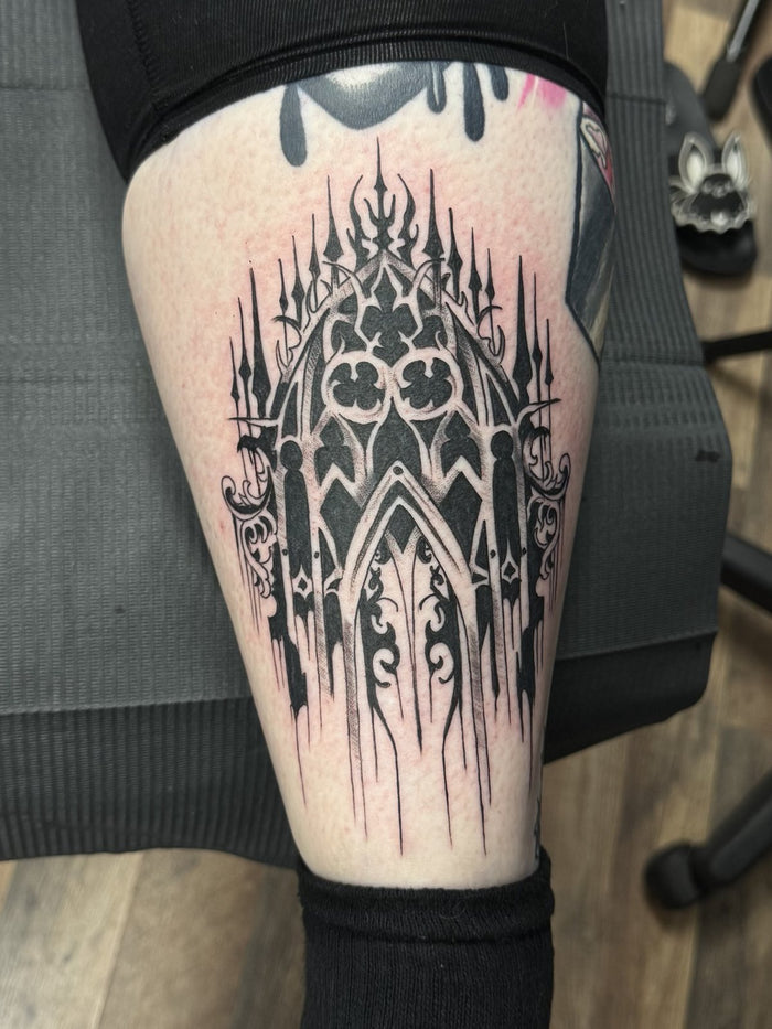Blackwork gothic cathedral thigh tattoo by Austina Obscure