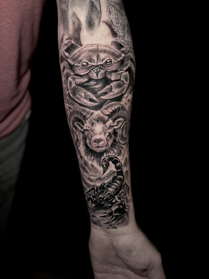 Zodiac crab, ram and scorpion forearm tattoo by Austina Obscure